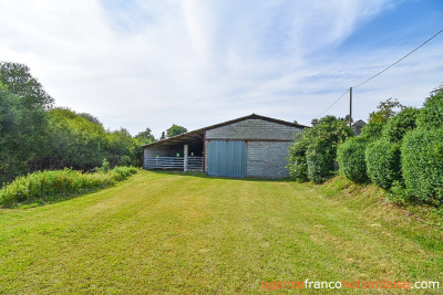 Boerderij met bijgebouwen en 4 hectare